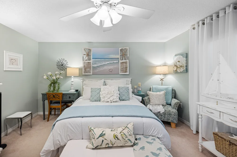 Coastal bedroom design by Joy Signature Designs