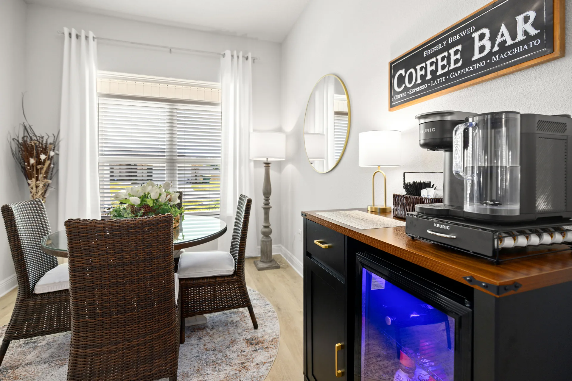 Coffee bar and dining area by Joy Signature Designs