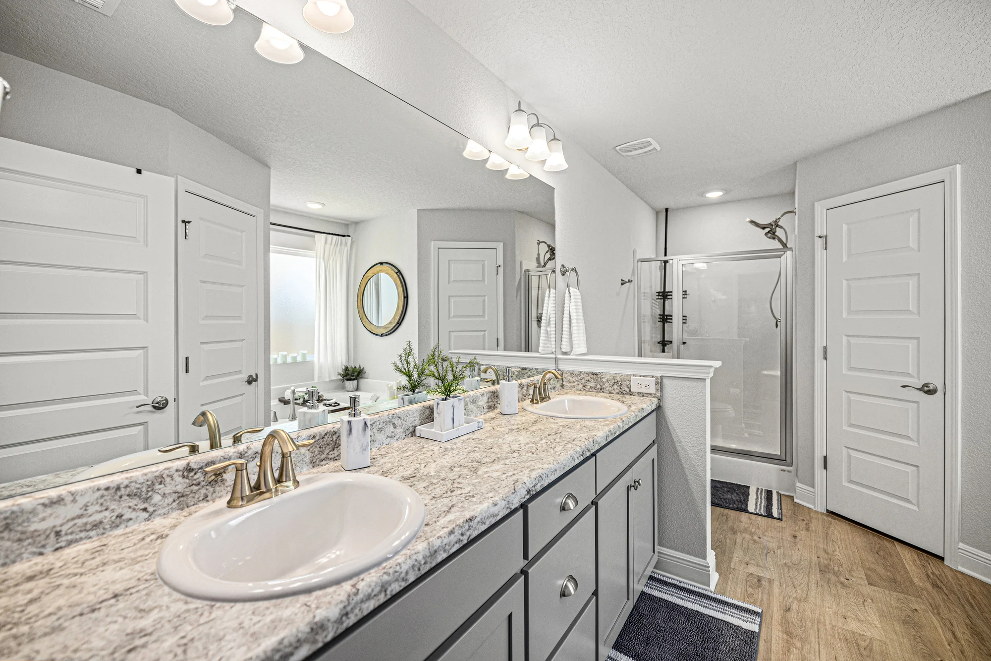 Master bath double vanity by Joy Signature Designs