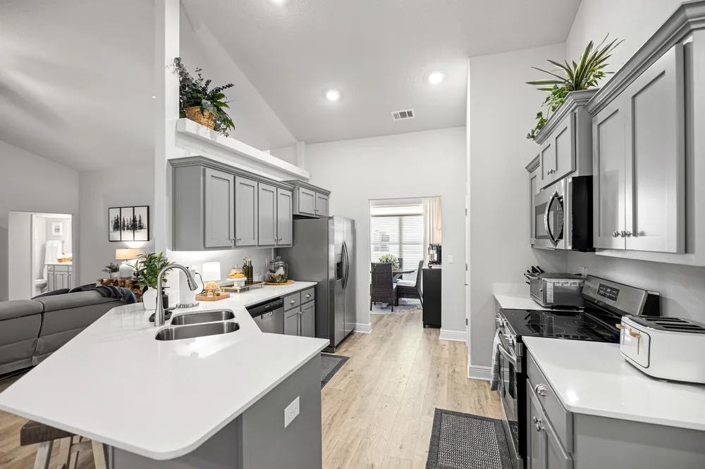 Modern grey kitchen by Joy Signature Designs