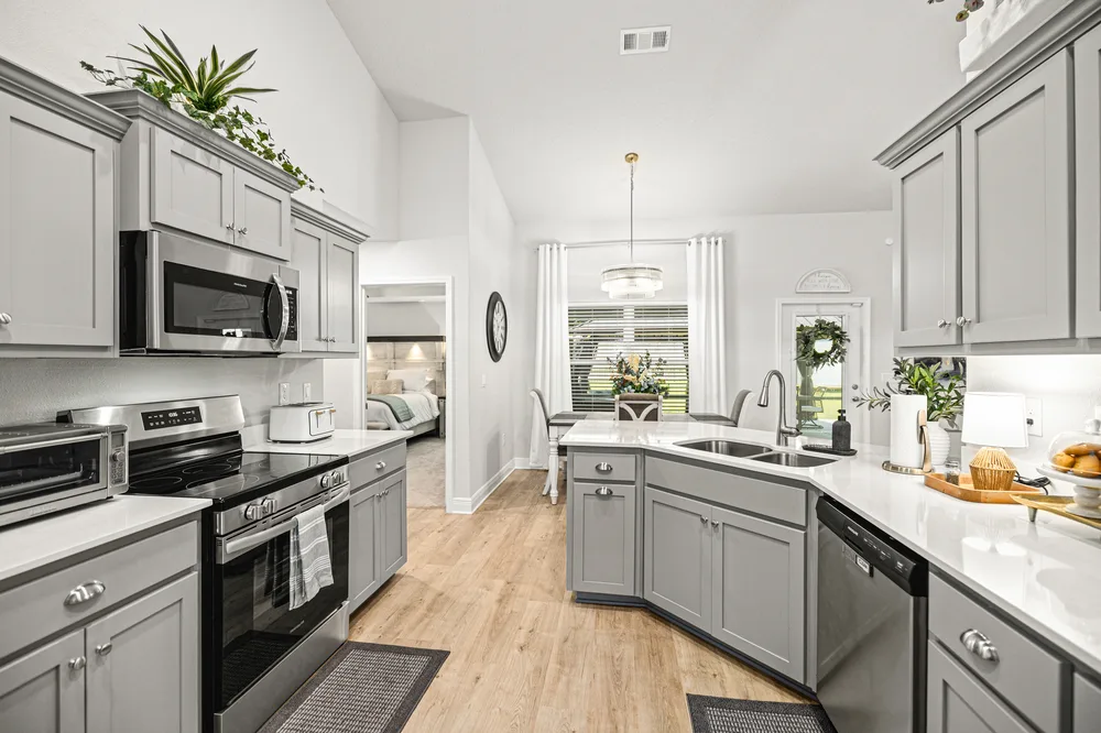 Open kitchen design by Joy Signature Designs