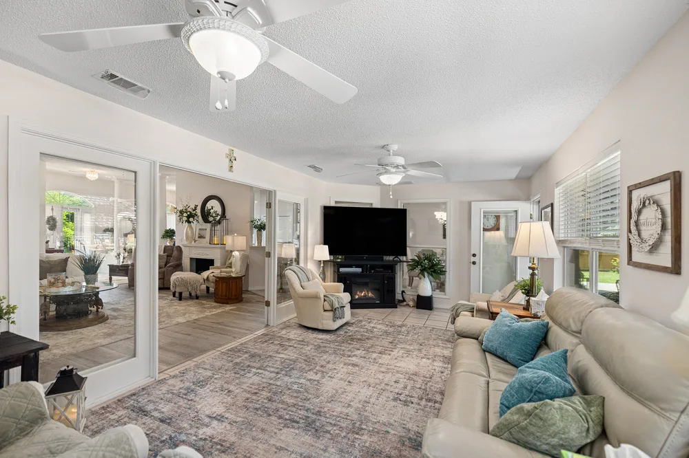 Cozy living space design by Joy Signature Designs