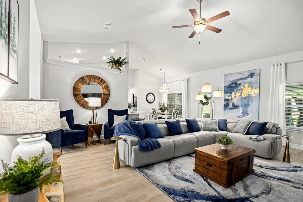 Bright open living room by Joy Signature Designs