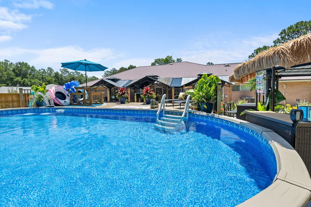 Pool and outdoor living design by Joy Signature Designs